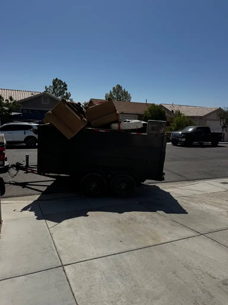 Loaded dump trailer parked kerbside in a Las Vegas neighbourhood